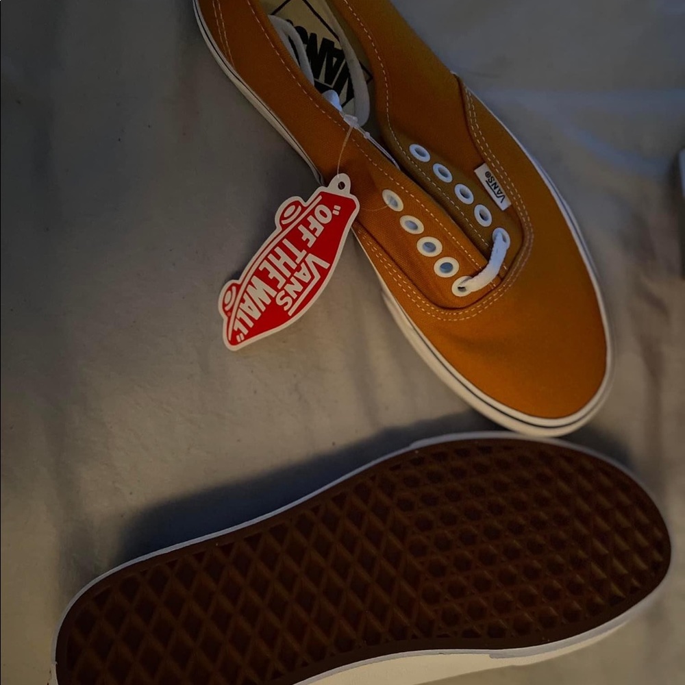Orange Vans off the wall shoes